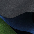A piece of black, blue, or green polyester ant cloth fabric for luggage and furniture.