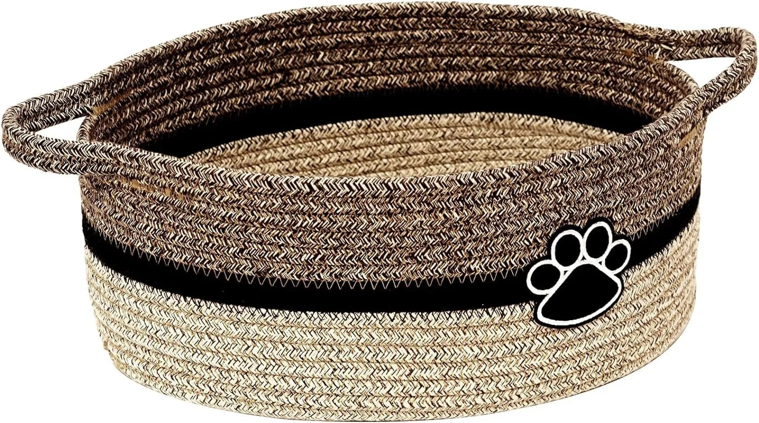 Light beige handmade cotton rope woven storage basket with a wooden handle on a table.