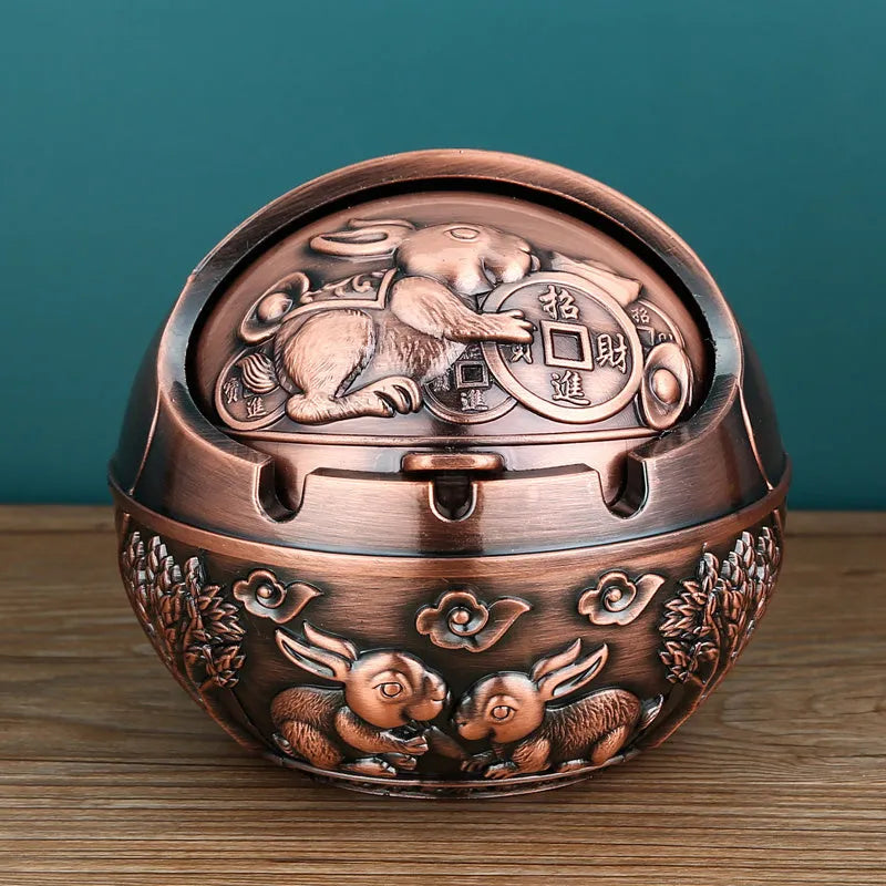 Alloy ashtray with smoke extinguishing slot in bronze finish featuring decorative dragon and phoenix design