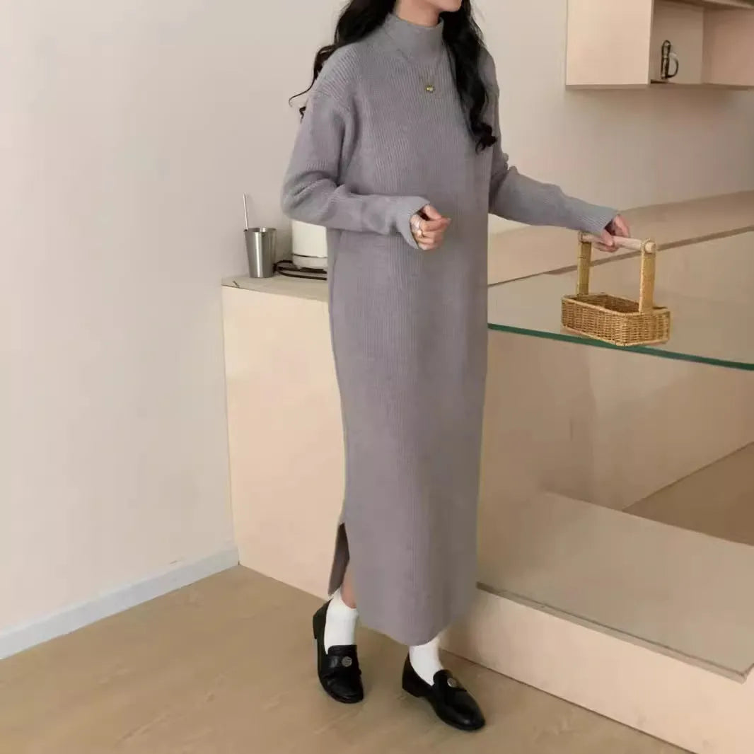 Beige acrylic knit dress with half-turtleneck collar and high waist.