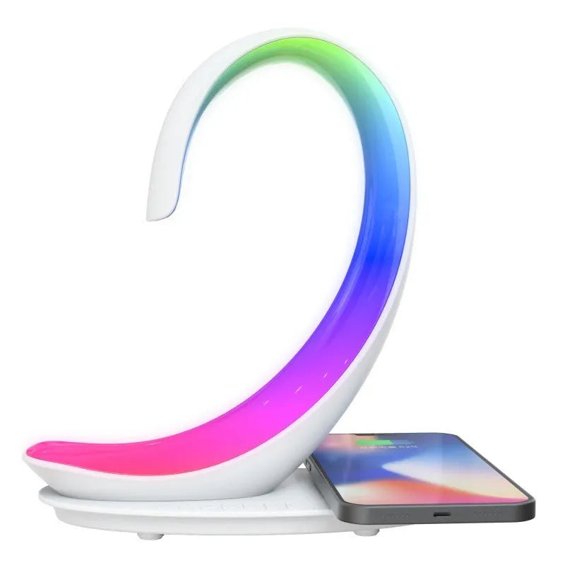 White swan shaped desktop lamp with wireless charging pad, Bluetooth speaker and colourful LED mood lighting