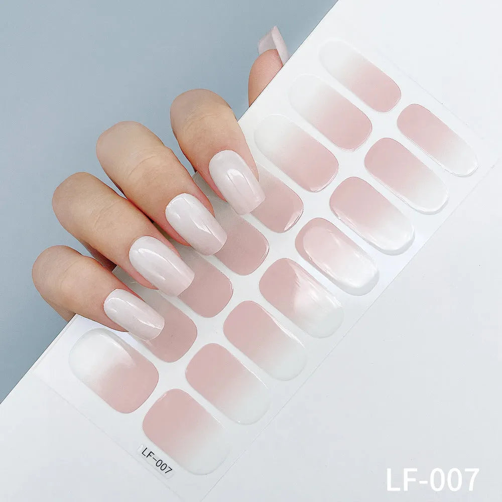 Full nail art sticker sheet showing 16 different solid colour designs including European simple nails and floral patterns