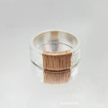 Copper bracelet with vintage ring design featuring irregular coil pattern in silver golden colour
