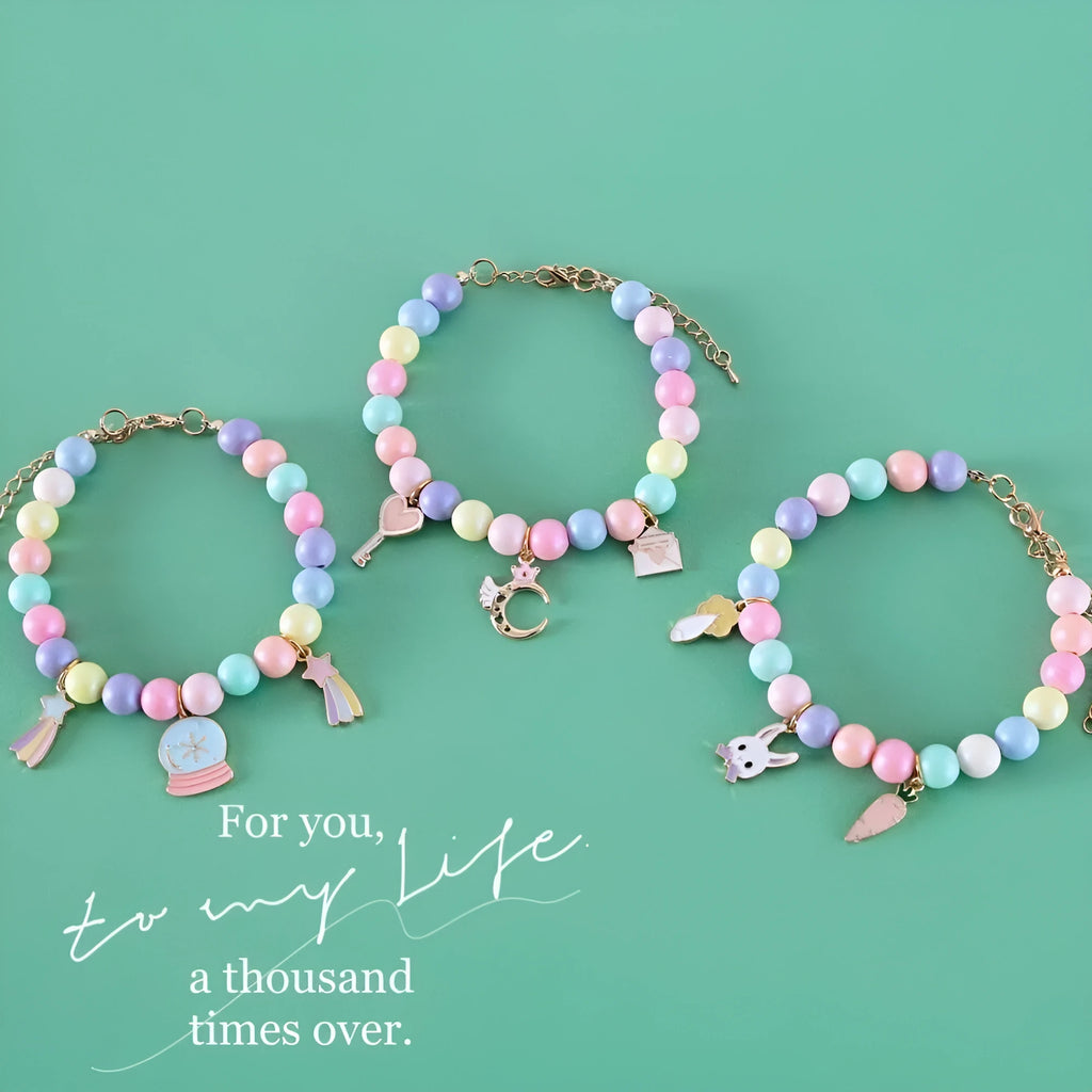 Colourful resin pet jewellery with moon and meteor motifs in macaron colours for dogs and cats
