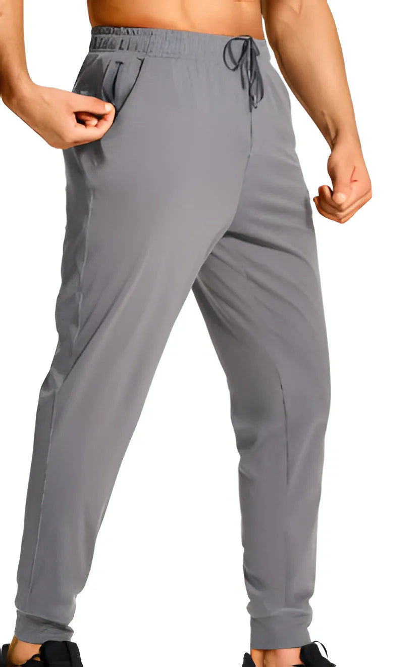 Men's loose fit casual trousers in solid colour with elastic waistband, available in multiple sizes