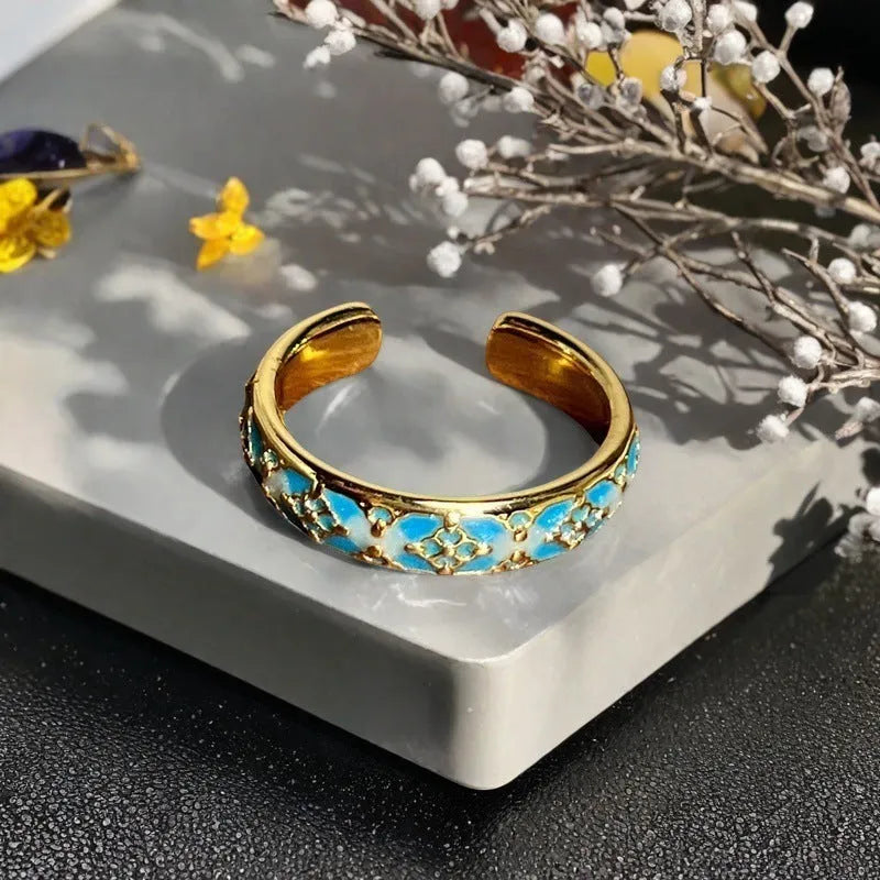 Adjustable vintage oil-dripping gourd copper ring with zircon inlay, showing flower shape in one of six colour options.