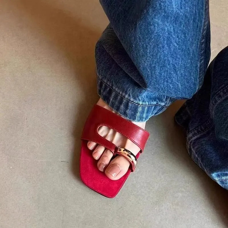 Women's plus size square toe outdoor slippers in leather with a rubber sole.