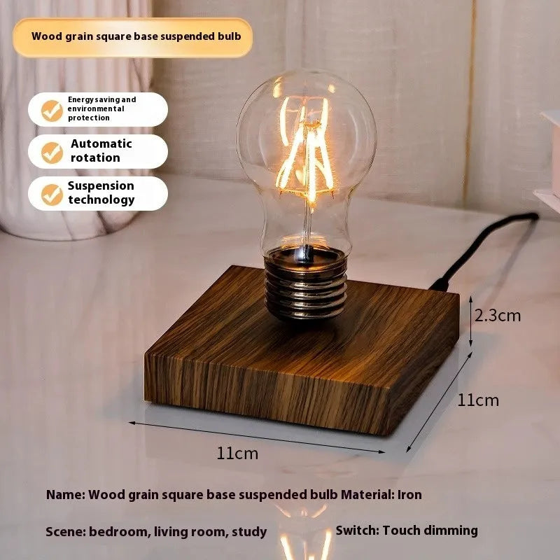 Black suspension bulb night lamp with wooden base on desktop