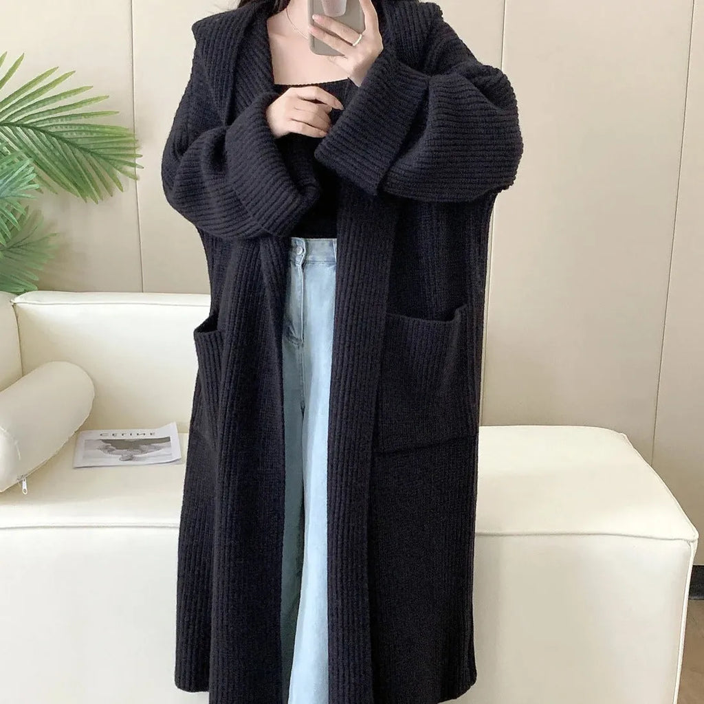 Loose fit women's hooded cardigan coat in soft acrylic fabric, shown in milky white.