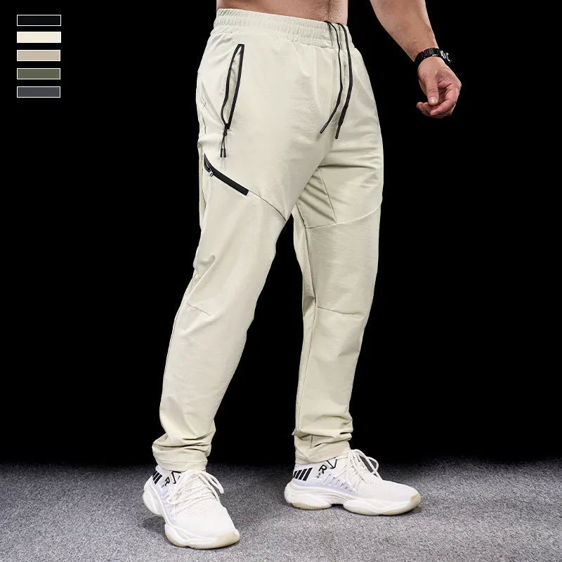 Men's waterproof quick-dry nylon exercise trousers in Army Green colour with mid waist design