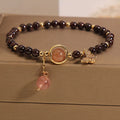 Black stone micro inlay butterfly pendant bracelet on wrist