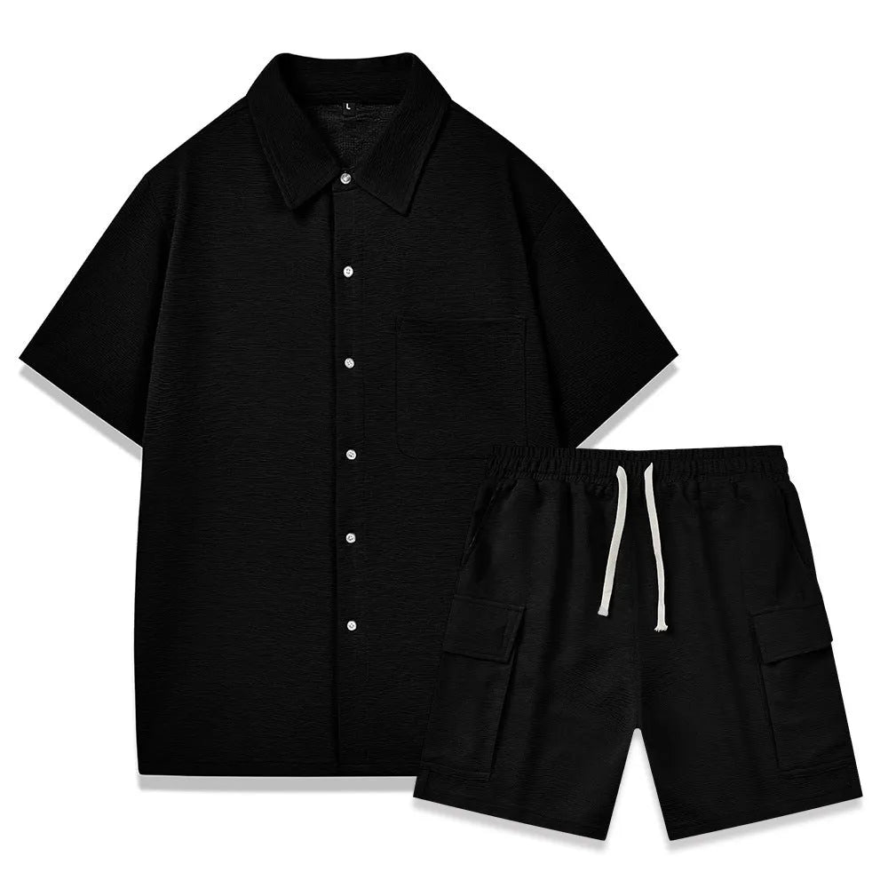 Women's beige polyester two-piece set with short sleeve top and elastic waist shorts laid flat.