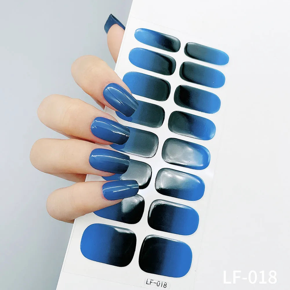 Full nail art sticker sheet showing 16 different solid colour designs including European simple nails and floral patterns