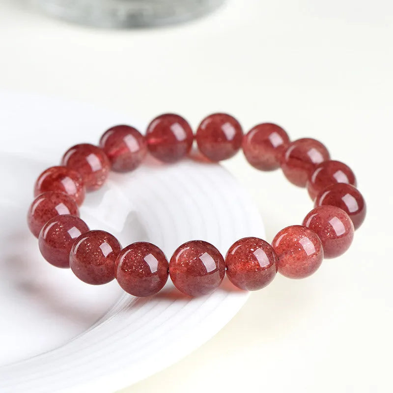Natural starlight cherry red strawberry quartz bracelet with geometric spherical beads