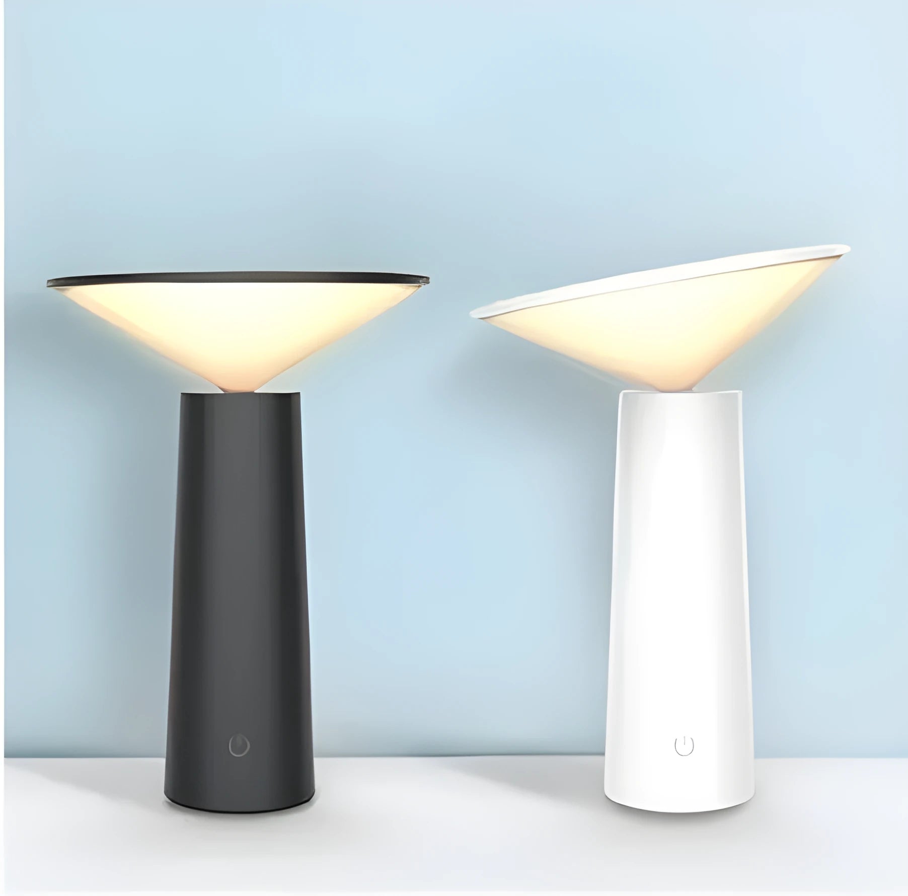 Black USB touch sensor reading lamp with tilted head on a wooden desk