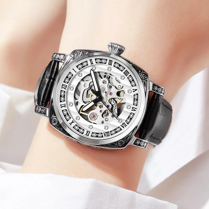 Men's mechanical wristwatch with luminous markers on leather strap