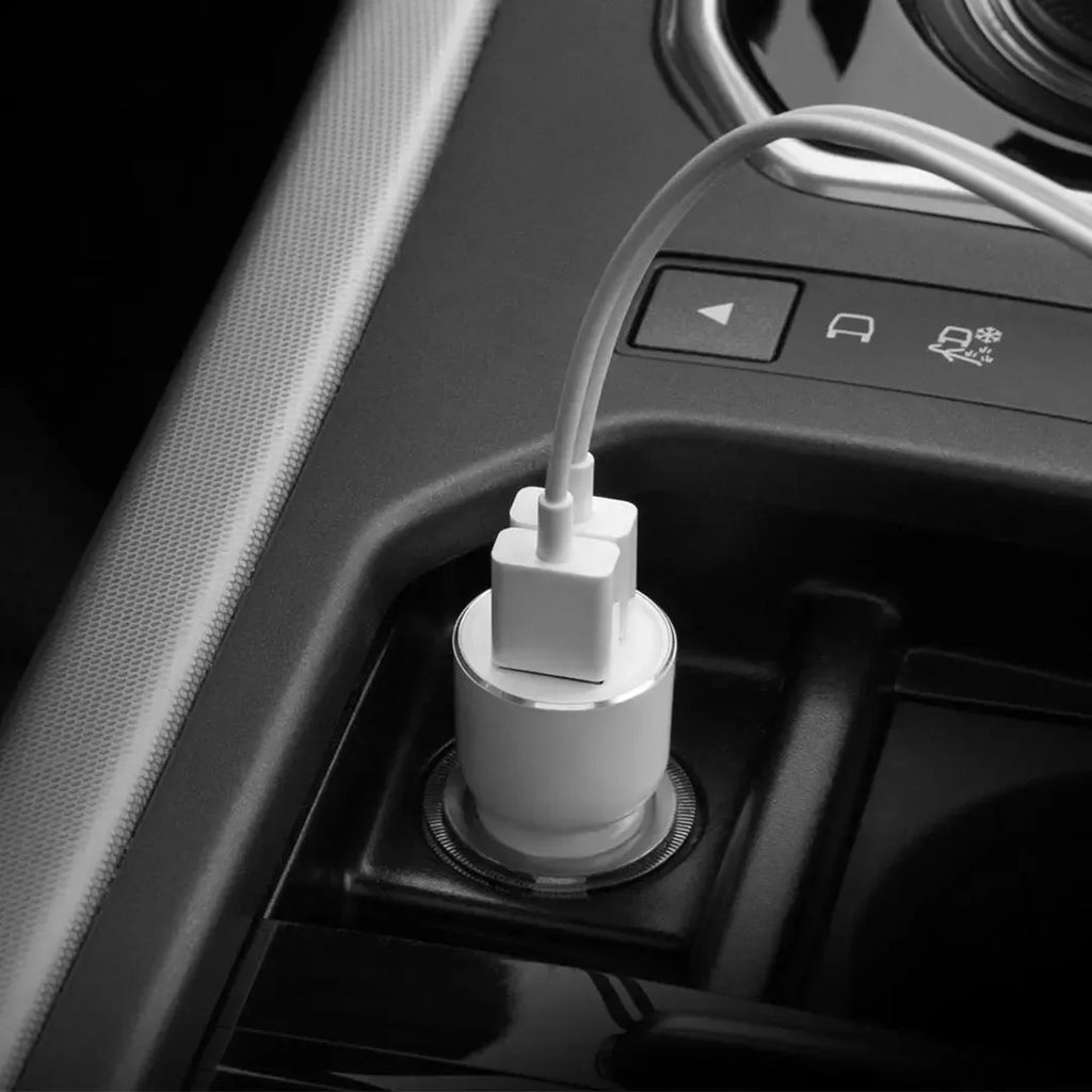 Black Ruimi 3S Bluetooth car charger with dual USB ports for device charging and music streaming