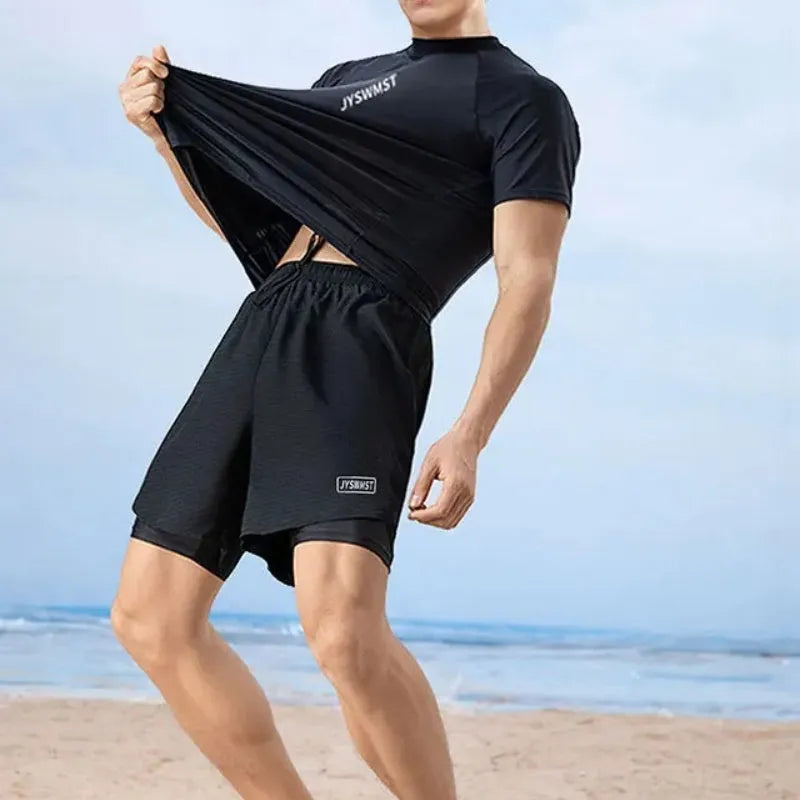 Men's patterned two-piece swimsuit set showing top and trousers on a size chart background.