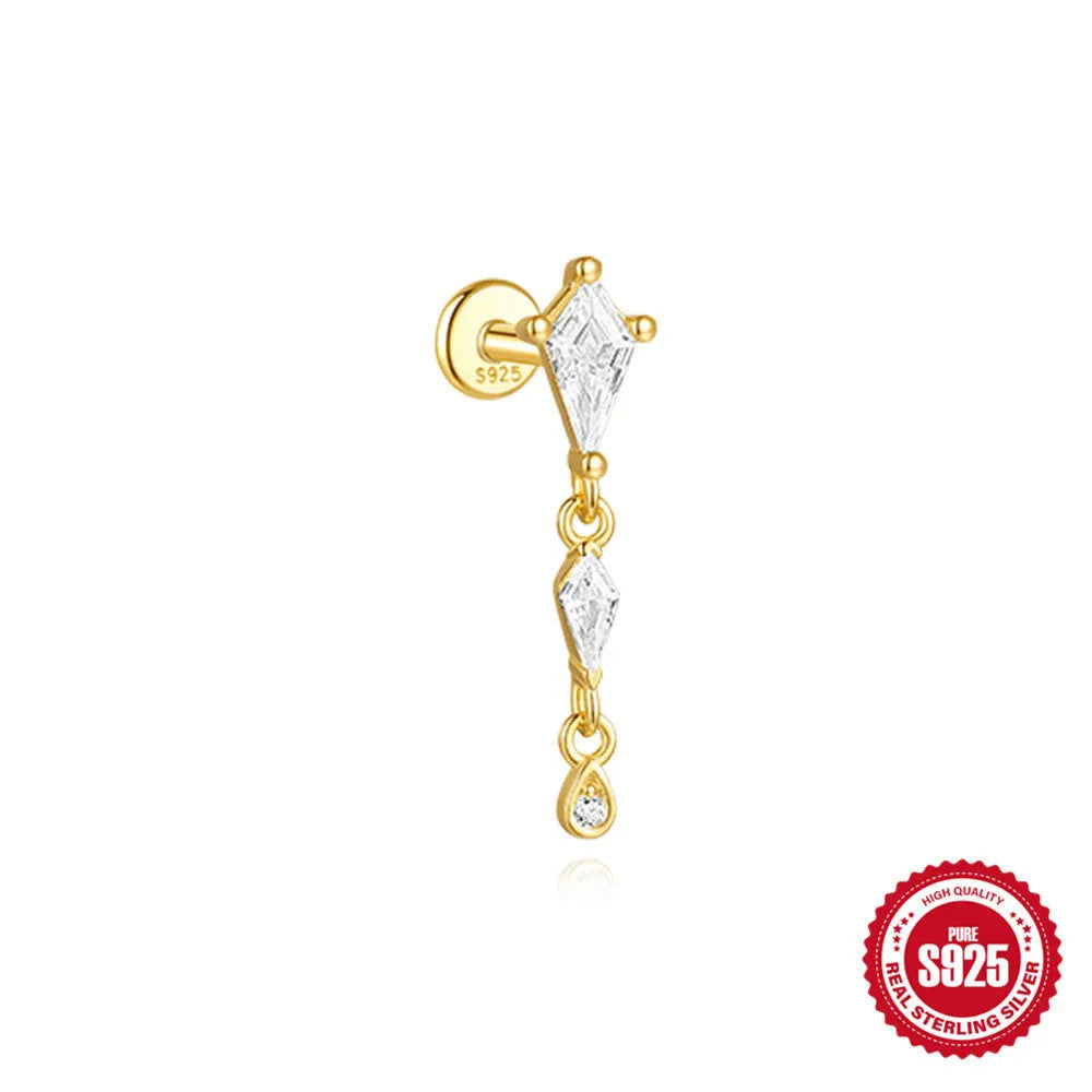 Geometric kite-shaped sterling silver earring with rhinestone head and gold chain tassel.