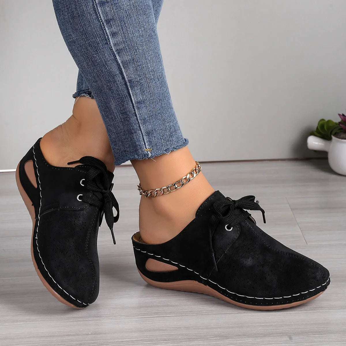 Women's baotou lace-up slippers in light grey with a hollow-out wedge and rubber sole.