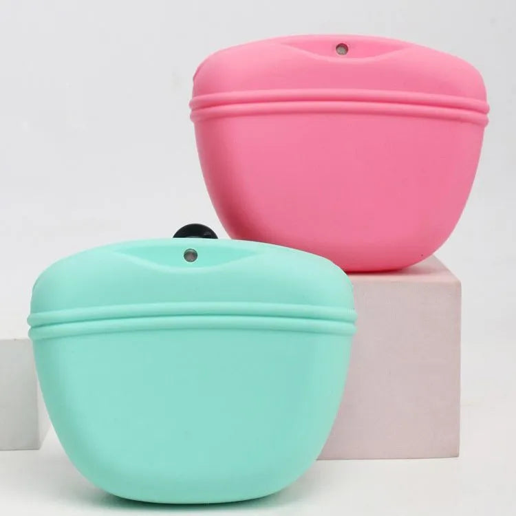 Coloured silicone dog treat bag with clip and magnetic opening, shown with dog training treats.