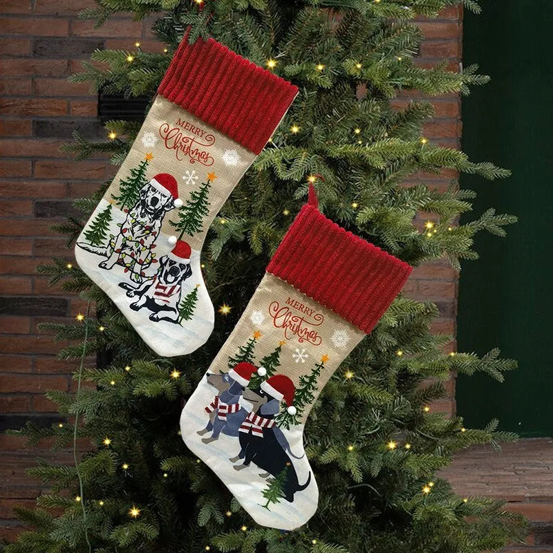 Pet Christmas tree hanging sock with fireplace design in cloth material measuring 46cm by 28cm