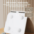 White professional smart body fat scale with eight electrodes and LED display.