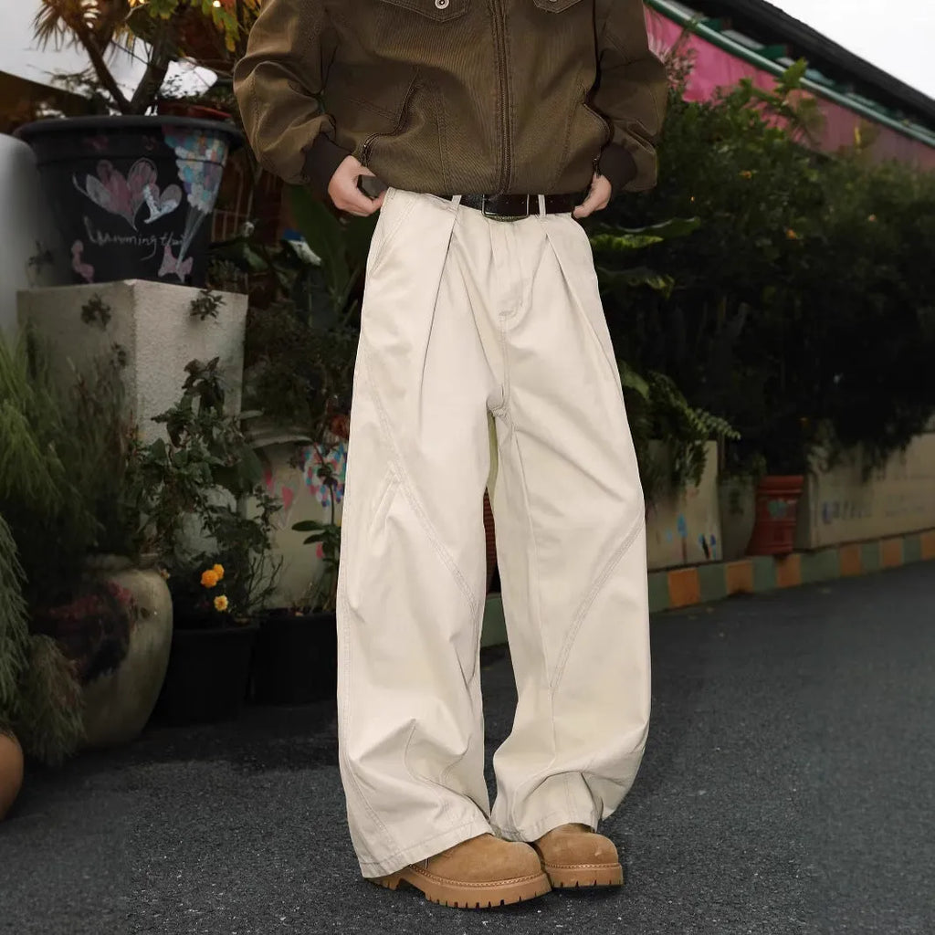 Men's pleated straight leg trousers in cotton-polyester blend with elastic waist available in black, brown, apricot