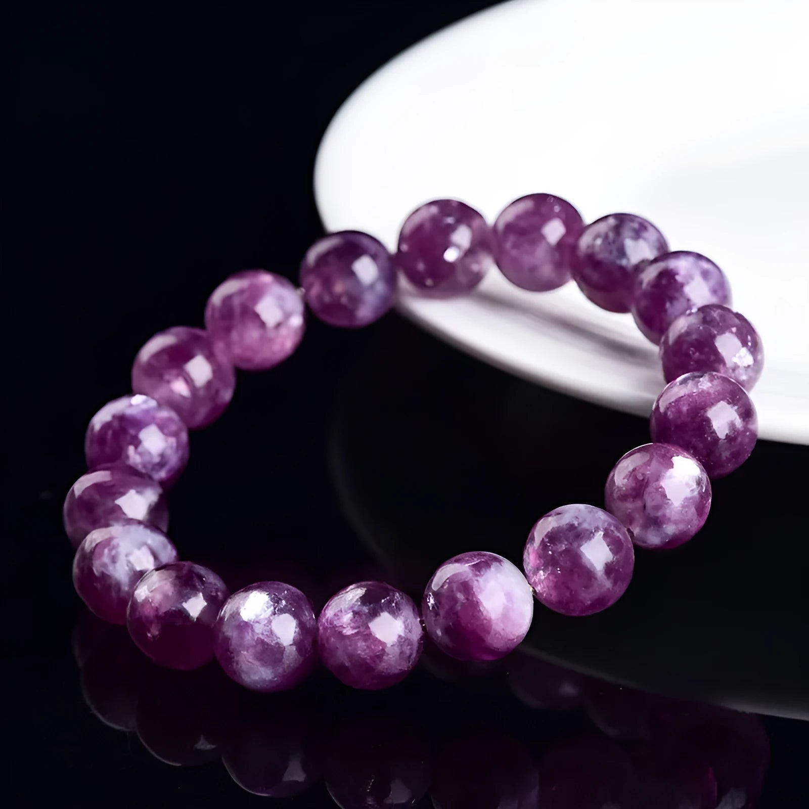 Grandmother Crystal purple bracelet with geometric beads in a single circle on a white background.