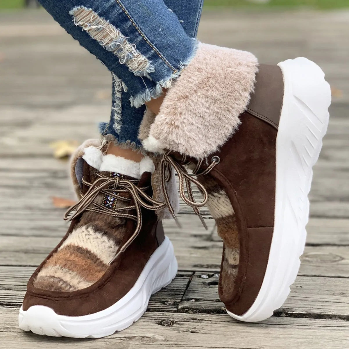 Women's beige lace-up snow boots with plush lining and non-slip rubber soles