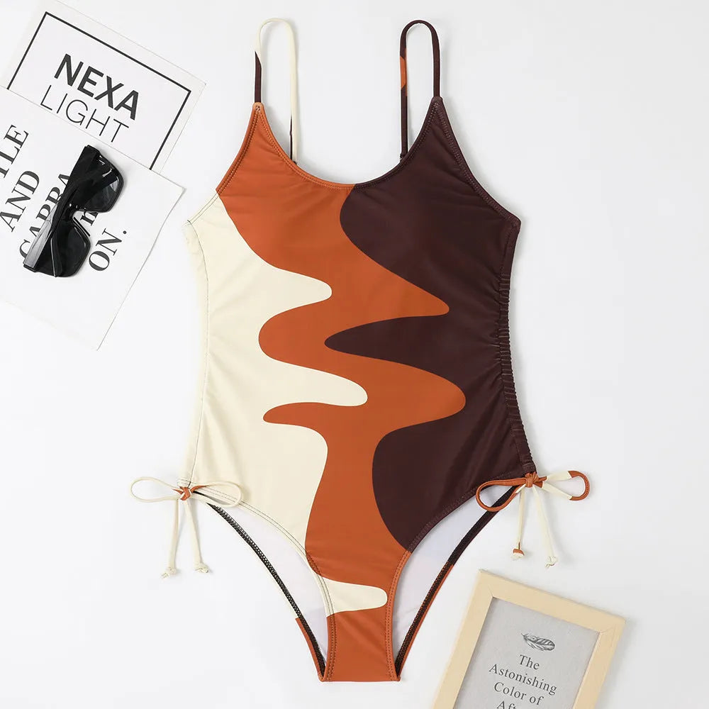 Blue women's sleeveless one-piece swimsuit with fixed swimming trunks on a mannequin.
