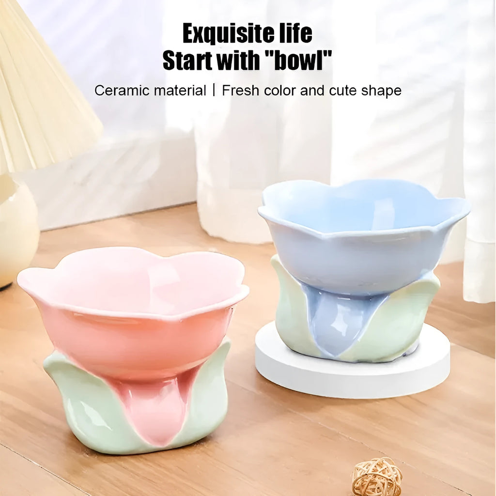 Blue and pink floral patterned ceramic raised pet bowl with non-slip base for cats and small dogs