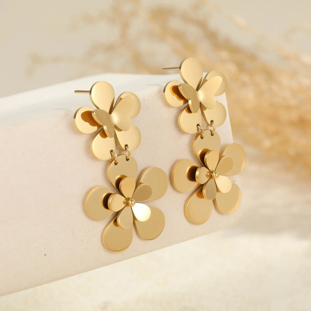 Gold flower butterfly stainless steel earrings with 18K electroplated finish and floral design elements