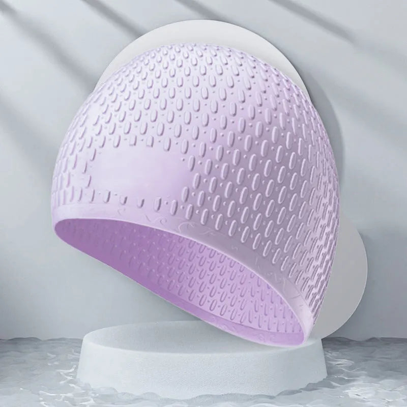 Silicone swimming cap with water drop design in solid colour options