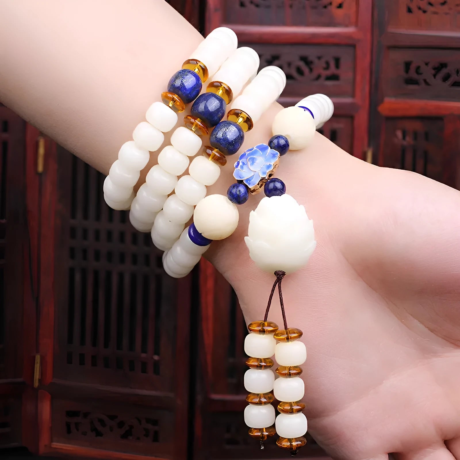 White jade Bodhi seed bracelet with 6x8mm beads showing multiple decorative style options