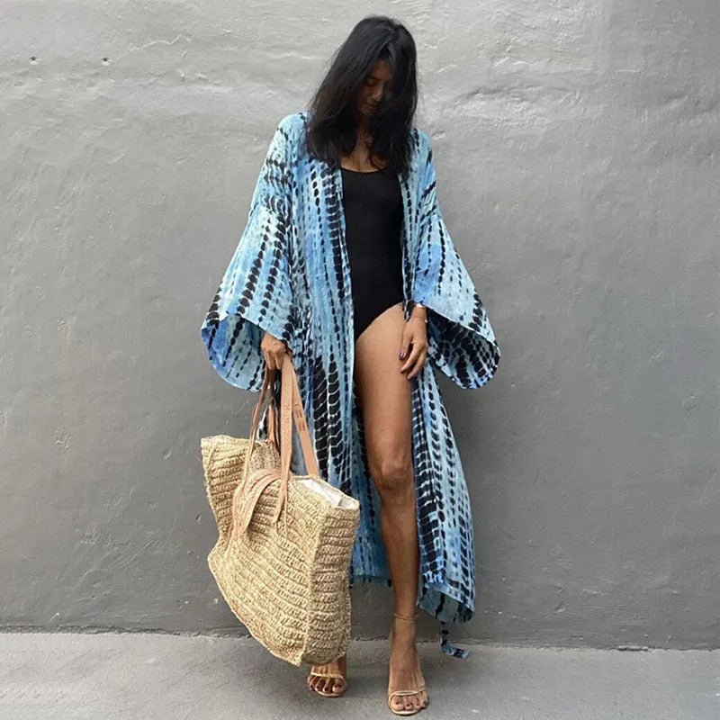 Women's printed cotton beach cover-up shirt in loose fit for sun protection over bikini.
