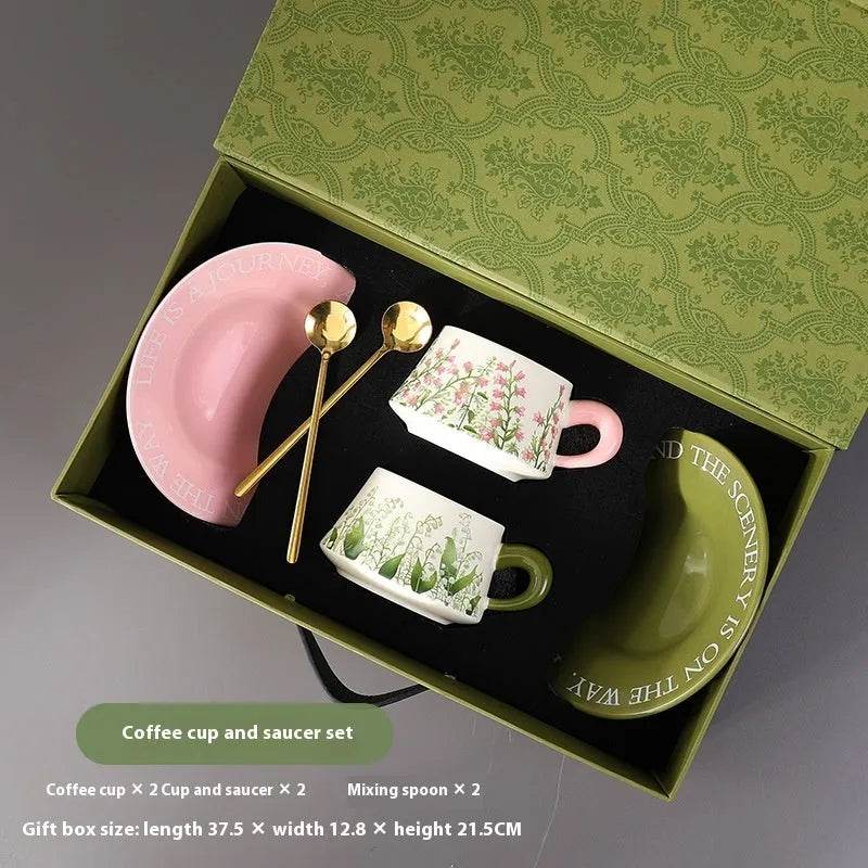 Ceramic coffee cup and saucer set with 300ml capacity cups and matching stirring spoons
