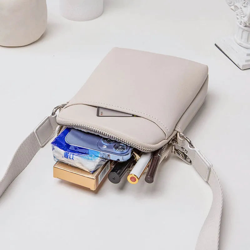 Solid colour simple PU crossbody shoulder bag for mobile phones in black, beige, khaki, or green.