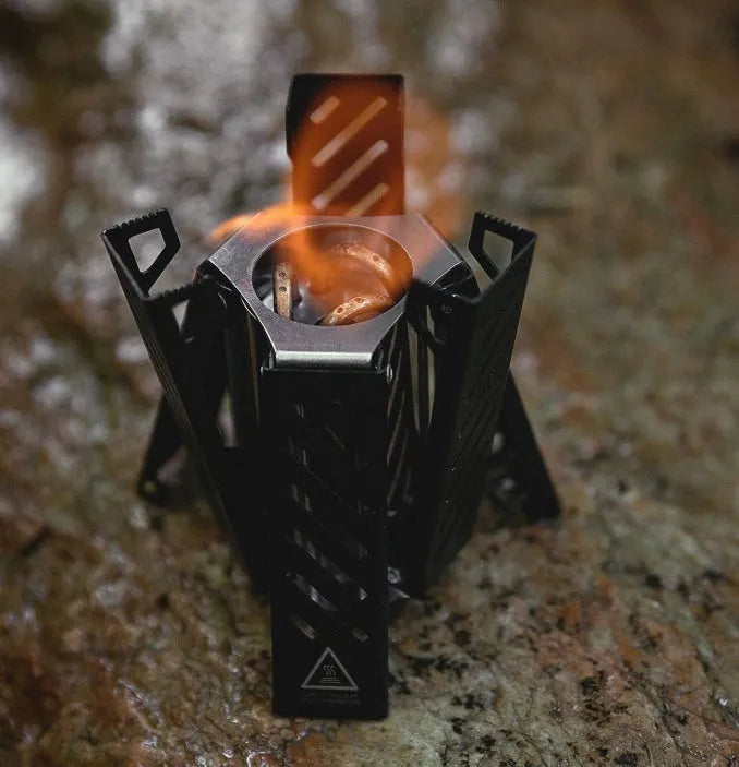 Hexagon foldable alcohol camping stove showing black colour option with dimensions