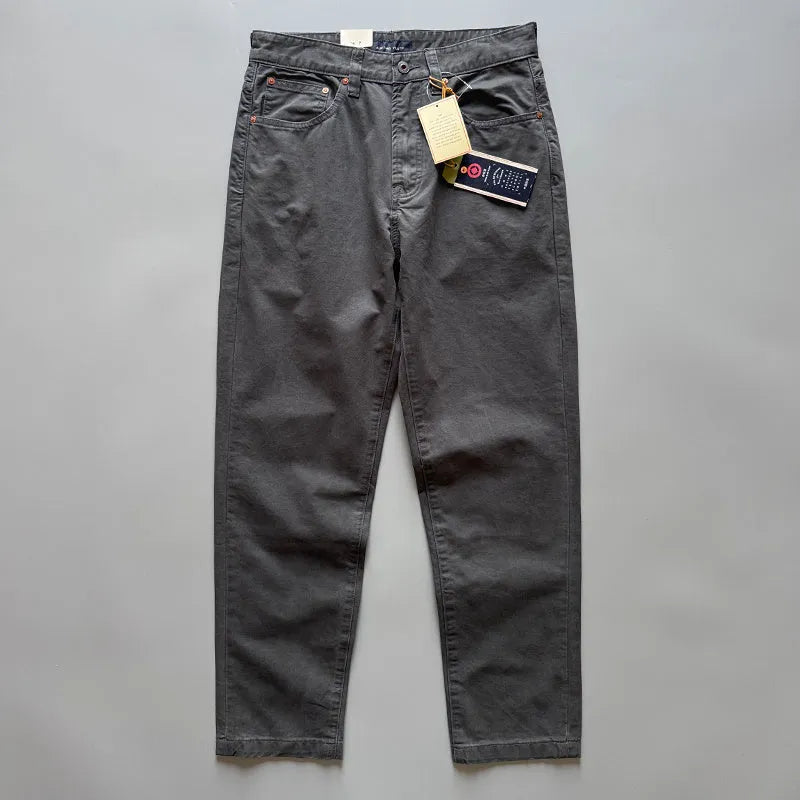 Men's straight-leg cotton trousers in army green shown flat, detailing the five-pocket design and mid-waist fit.