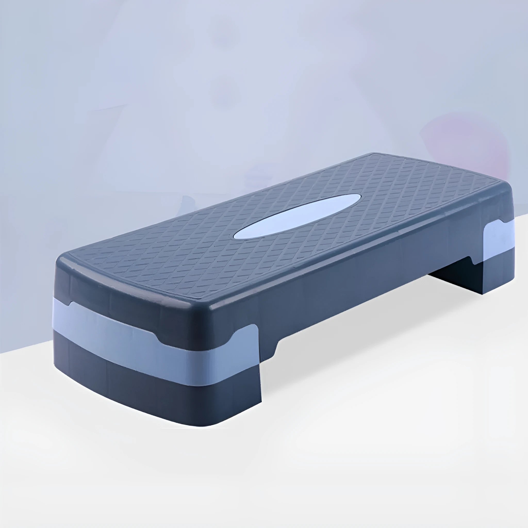 Grey Fit Step aerobics platform made of ABS plastic, dimensions 68cm long by 28cm wide by 15cm high.