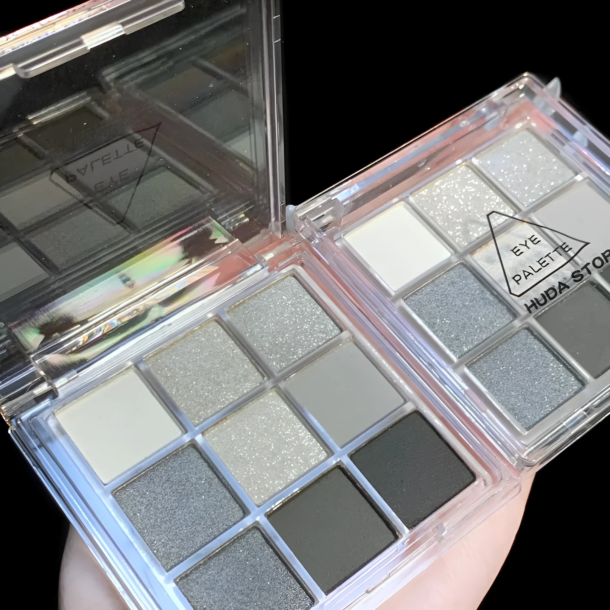 9-colour smoked eyeshadow palette showing white, silver, black and iron grey shades