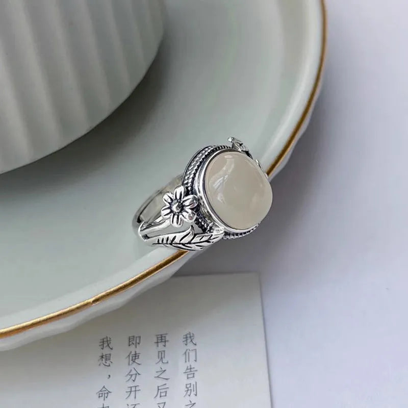 Adjustable copper vintage ring with antique finish and white chalcedony appearance
