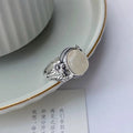 Adjustable copper vintage ring with antique finish and white chalcedony appearance