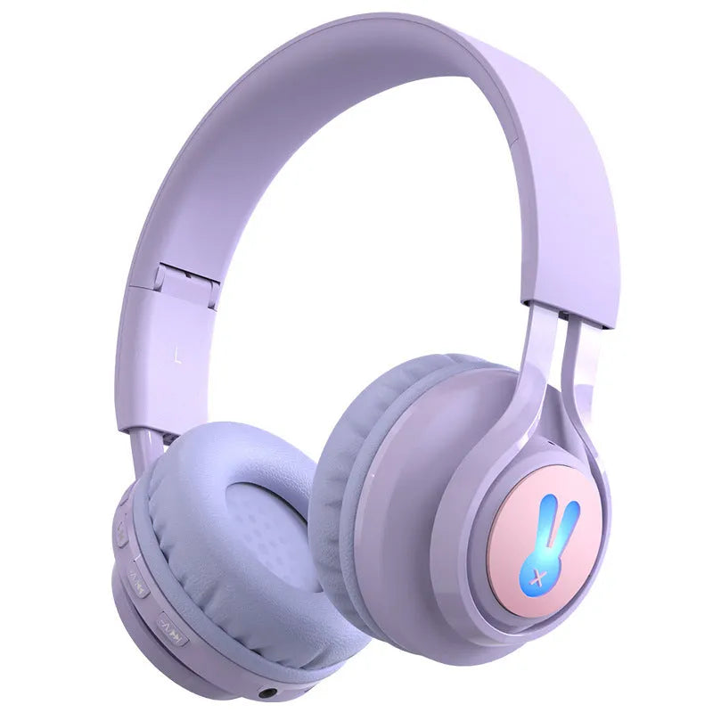 Wireless children's headphones with RGB LED lights in bunny pink colour with stereo sound and microphone