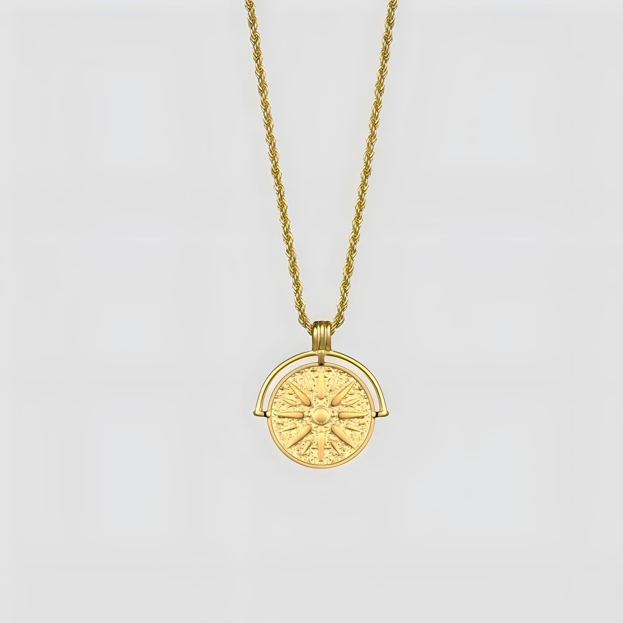 Round stainless steel pendant necklace with sunflower embossing and geometric design on adjustable hemp flowers chain
