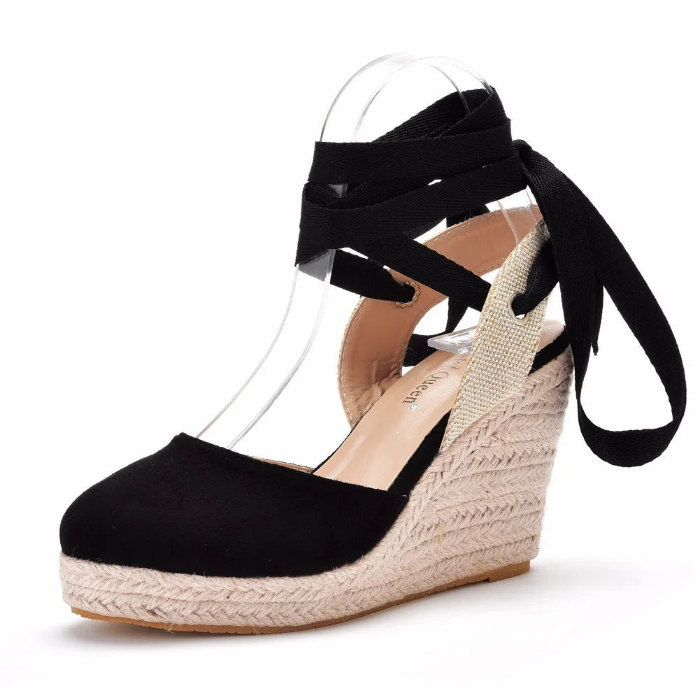Women's apricot bohemian wedge sandals with platform sole, round fish mouth toe, and tassel decoration.
