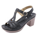 Women's apricot patent leather sandals with a thick high heel and metal buckle stitching detail.
