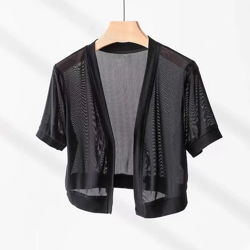 Women's French-style irregular collar shirt with long bell sleeves and tie front detail in polyester fabric.