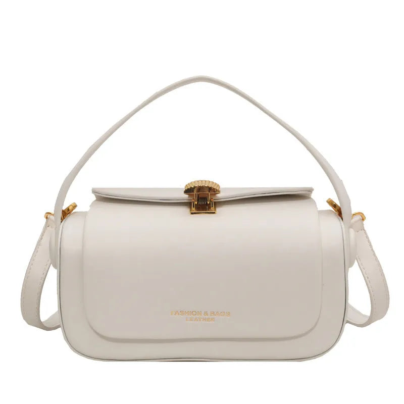 Women's personalised PU leather shoulder messenger bag in beige with letter detailing and stitching.